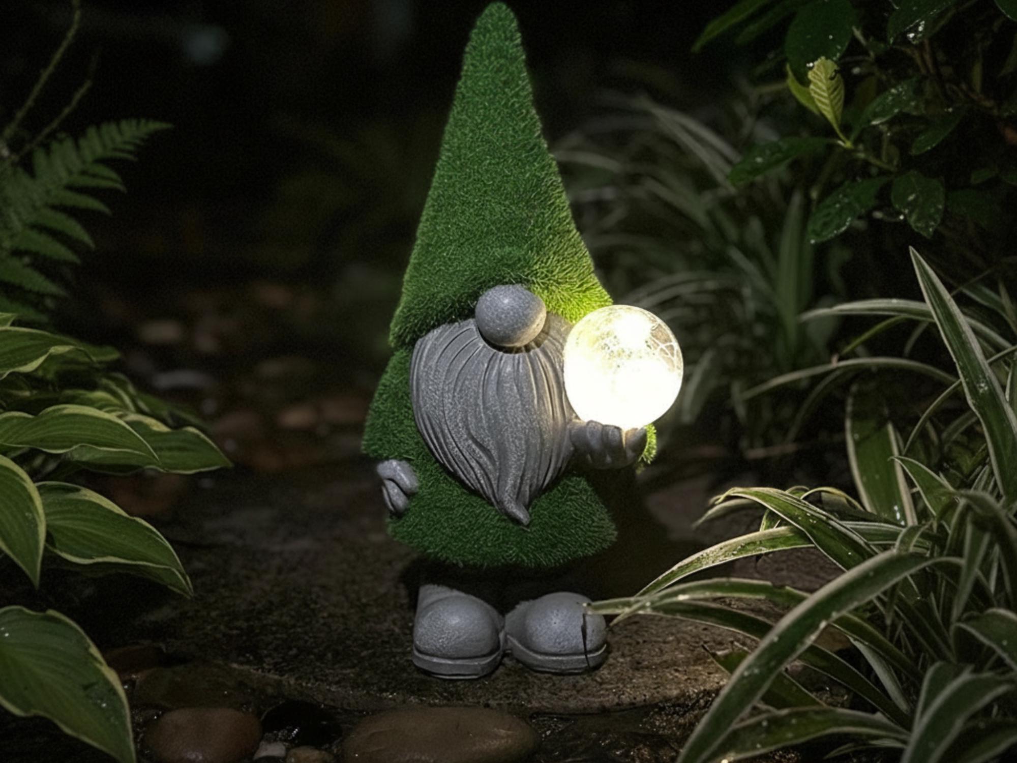 Magic orb garden gnome glowing among dark green plants