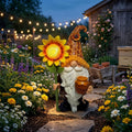 Solar sunflower gnome with honey jar glowing in an evening garden