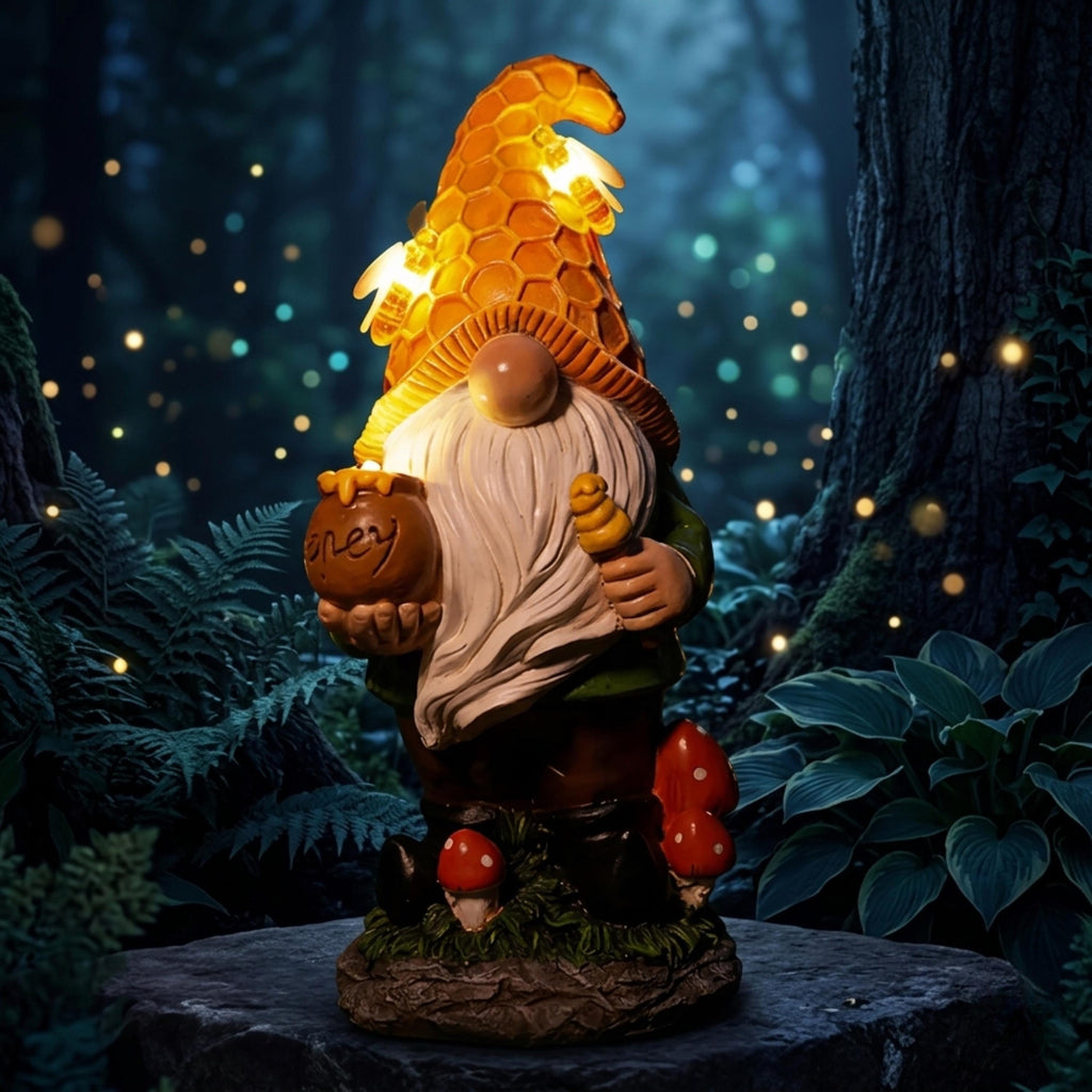 Solar beehive gnome glowing on a dark garden ledge