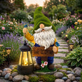 Solar welcome garden gnome holding a glowing lantern beside a flower path