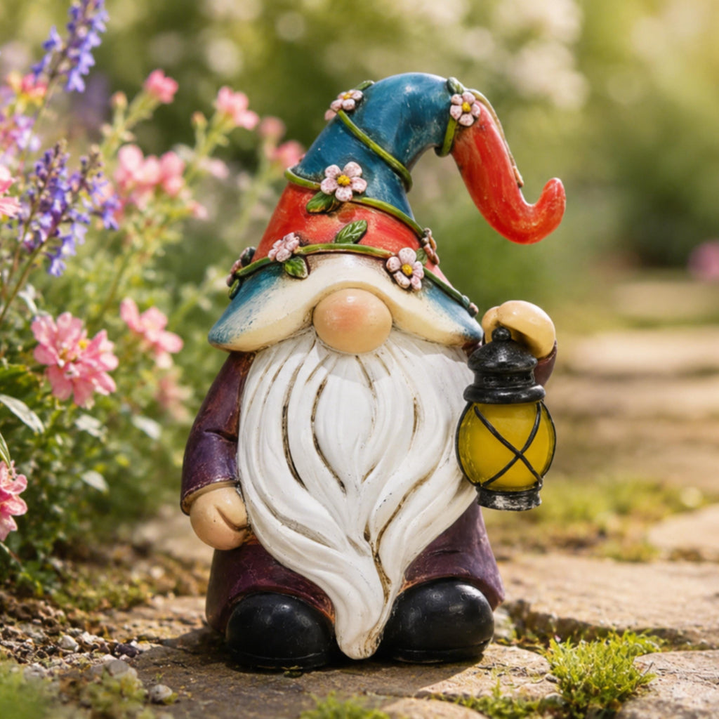 Mini garden gnome with floral hat and lantern beside a path