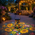 Colorful sunflower solar lantern projecting floral light patterns on a patio